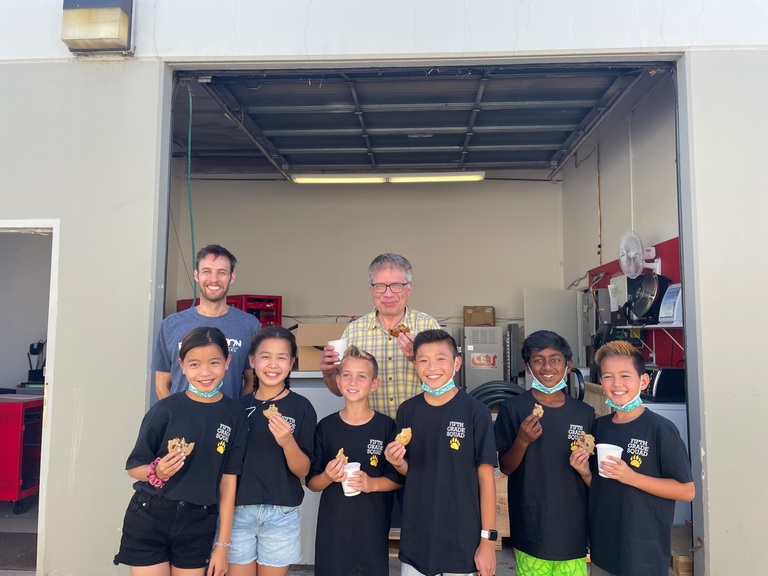 Sharing milk and cookies with the Tech_Bears during their visit to YouSolar in September (from left to right): Kiana, Kayla, Keenan, Elliott, Manith, and Ethan