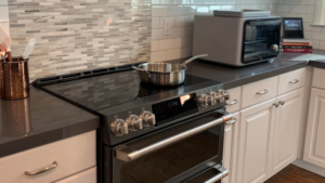 An induction stove in an all-electric home. Large induction stoves like the one shown can have a rating of 17.4 kilowatts!