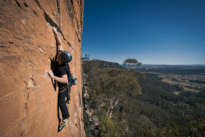 Marcus climbing Flaming Flamingo, 5.11c in the Blue Mountains of New South Wales.
