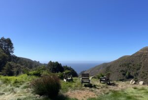 The off-grid home is built on a natural terrace and has stunning views out to the Pacific Ocean.