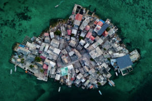 Santa Cruz del Islote, one of the most densely populated islands in the world, is extremely vulnerable to climate change. Source: The Guardian