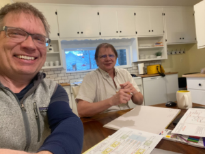 Arnold Leitner, CEO, left, and Jon Farley, Embedded Systems Engineer, review changes to the PowerBloc’s operating system, TRAFFIC™ OS. Dunsmuir, California.