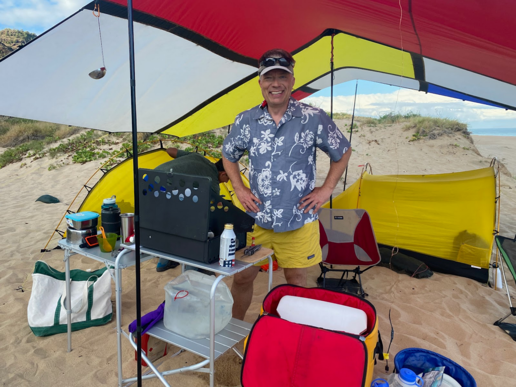 Arnold Leitner, CEO of YouSolar, cooking lunch on Polihale Beach, Kauai. Arnold Leitner, CEO of YouSolar, cooking lunch on Polihale Beach, Kauai.