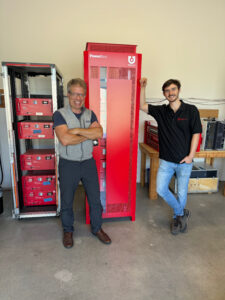 Arnold Leitner (CEO) and Marcus with the Gen 3 Powerbloc cabinet.